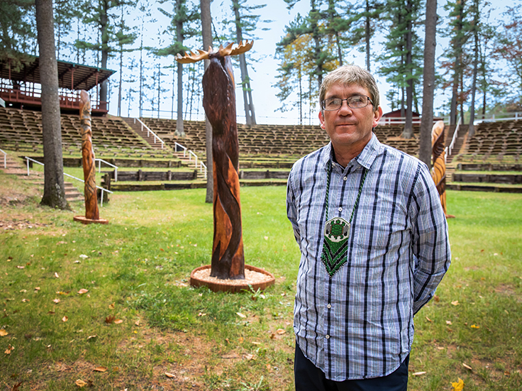 Leader of Menominee Tribe shown on tribal lands