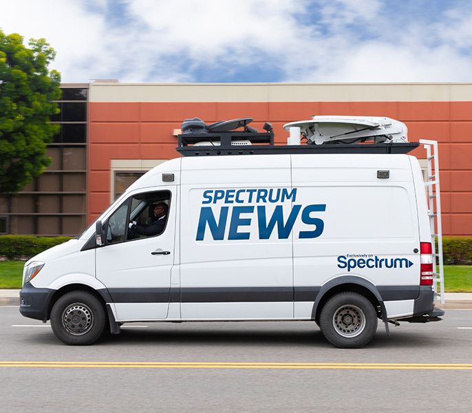 Spectrum News van in action